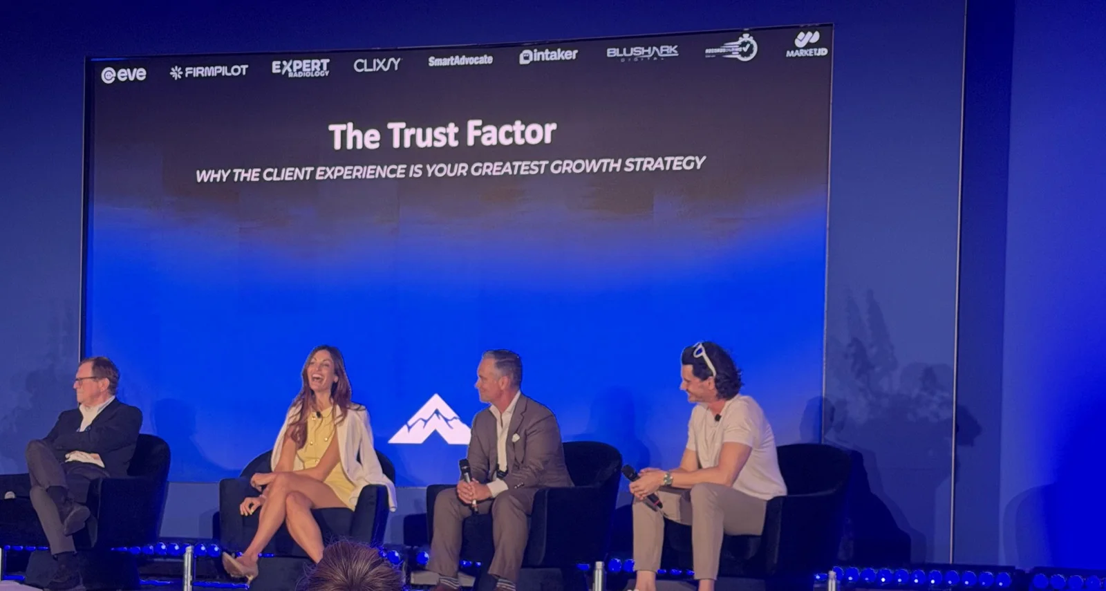 Chris Rose on stage on the Trust Factor panel — why the client experience is your greatest growth strategy